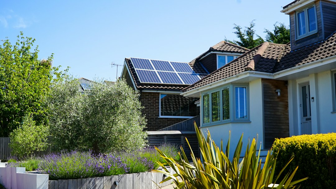 Home with solar panels representing energy efficiency