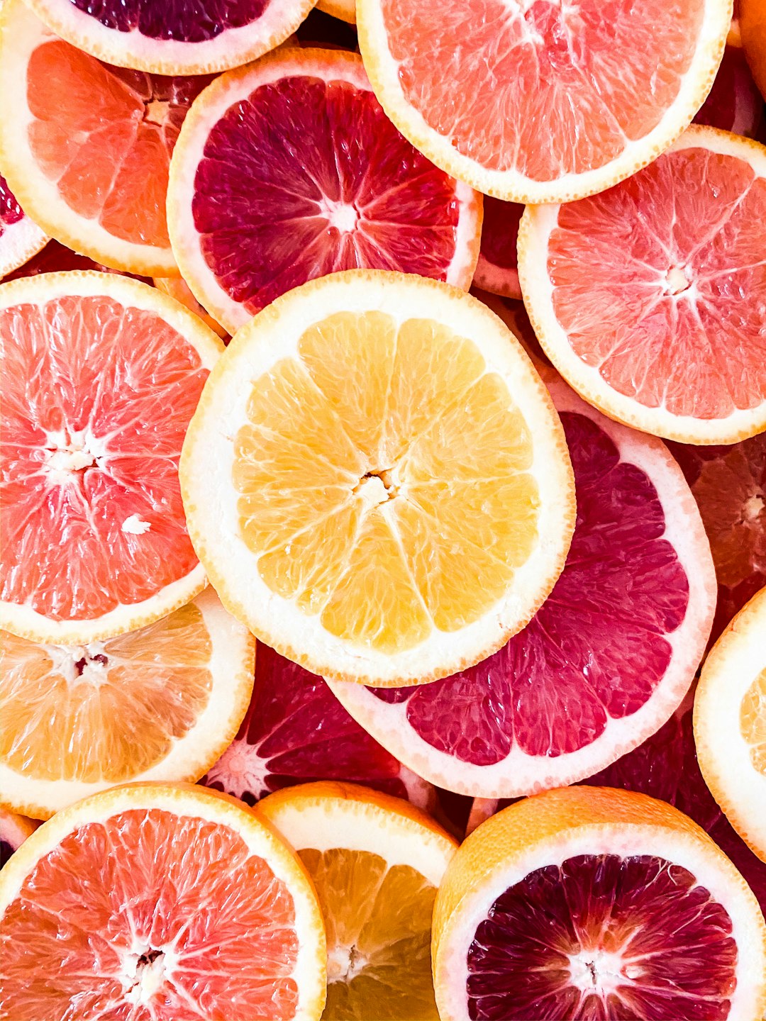 Sliced grapefruits representing citrus metabolism support